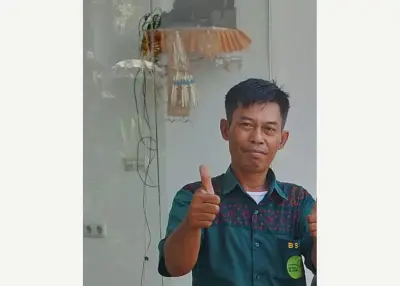 Made Sutama — transfer bandara pribadi